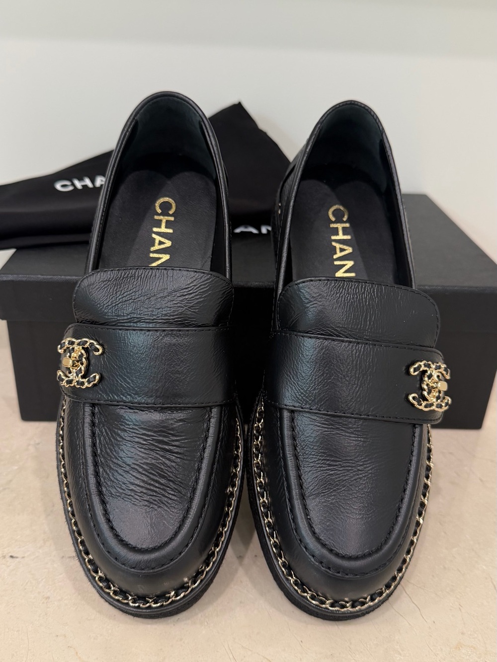 CHANEL Loafers in Black Leather w/ Gold Chain accents; Size 36
